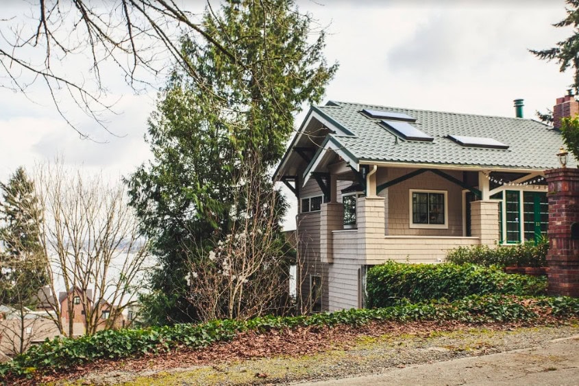 house next to large tree in the Leschi neighborhood of Seattle