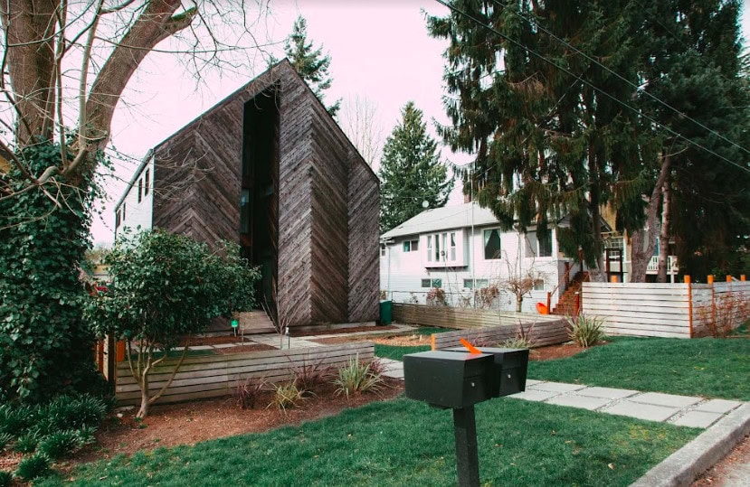 modern looking home with green lawn