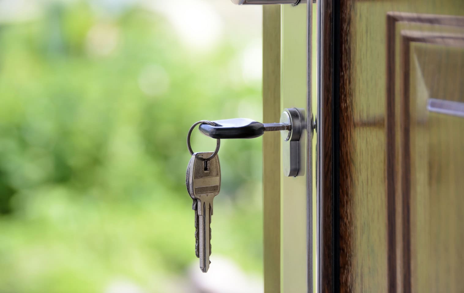 FHA Loan: Washington State keys hanging out of a front door lock